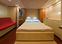 Double bedroom on a Continential 80 motor yacht, designed and built at Cantieri CNM. Cannes, France.