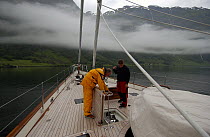 Superyacht "Adele" exploring the Norwegian Fjords in the Sognefjord area, during week 25 of her maiden voyage. Owner Jan-Eric Osterlund (left) and crew on deck. ^^^ Adele is a 180-foot Andre Hoek des...
