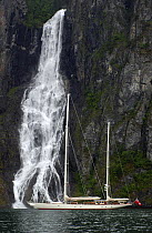 180ft Superyacht "Adele" exploring the Norwegian Fjords in the Sognefjorde area, during week 25 of her maiden voyage. A waterfall forms a dramatic backdrop. ^^^ Adele is a 180-foot Andre Hoek designe...