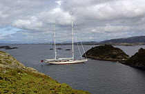 Overlooking 180ft Hoek Design Superyacht "Adele". The yacht is anchored in a natural harbour while exploring Sognefjord, Norway during her maiden voyage. ^^^ Adele is a 180-foot Andre Hoek designed y...