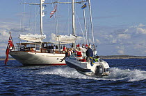 Speedboat with passengers approaching 180ft Superyacht "Adele" in Swedish waters during her maiden voyage in 2005.