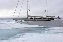 Superyacht "Adele" makes her way through the icy waters of Spitsbergen (also know as Svalbard) in Norway, during her maiden voyage in 2005. ^^^ Adele is 180 foot Andre Hoek design, built by Vitters S...