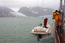 Tender is lowered into the water from superyacht "Adele", during her maiden cruise to Spitsbergen (also known as Svalbard) in Norway. ^^^ Adèle is a way of reaching the unknown, of meeting new cultur...