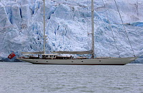 Superyacht "Adele" alongside the wall of ice that clings to the mountainous coasts of Spitsbergen, Norway.^^^ Adele is 180 foot Andre Hoek design, built by Vitters Shipyard, Holland, and owned by Jan...