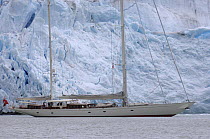 Superyacht "Adele" alongside a wall of ice that clings to the mountainous coasts of Spitsbergen, Norway. ^^^ Adele is 180 foot Andre Hoek design, built by Vitters Shipyard, Holland, and owned by Jan-...