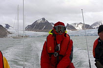 Crew on board a tender wrap up warmly as they power away from superyacht "Adele" in order to explore Spitsbergen's coast and wildlife. The trip was Adele's maiden voyage in 2005. The superyacht can be...