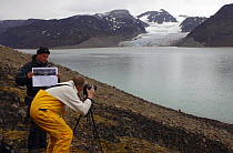 Photographing a glacier in Spitsbergen, Norway, from the land.^^^ During Adele's maiden voyage to the area Adele's owner Jan-Eric Osterlund and his guests used the yacht's tenders to explore the area'...