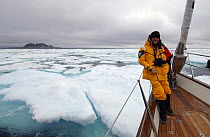 Owner Jan-Eric Osterlund on the deck at the bow of Superyacht "Adele", during her maiden voyage through the icy waters of Spitsbergen, in Norway's Arctic Circle. ^^^ Osterlund has created in Adele his...