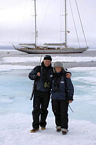 Crew and guests from Superyacht "Adele" explore the frozen waters of Spitsbergen (also know as Svalbard) in Norway. ^^^ The yacht can be seen in the background. She is 180 foot Andre Hoek design, bui...