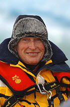Jan-Eric Osterlund, owner of Superyacht "Adele", enduring the elements, during the yacht's maiden voyage to Spitsbergen, Norway. ^^^ The 180-foot yacht is an Andre Hoek design, built by Vitters Shipya...