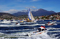 Assa Abloy arriving in first place into Hobart on leg 3 of the Volvo Ocean Race and wins the Sydney to Hobart leg, 2001-2002.
