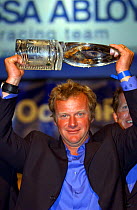"Assa Abloy" skipper Neal McDonald at the prize giving in Kiel, Sweden with the trophy for second overall in the Volvo Ocean Race, 2001-2002.