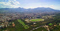 Sicily's capital Palermo, as viewed from Utveggio Castle (also known as Cerisdi). The castle sits on Monte Pellegrino and looks over the town and to the mountains.