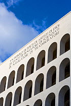 The iconic exterior of Rome's Palazzo della Civitlà del Lavoro (1938-43). This monumental building, designed by architect Marcello Piacentini, is situated in the EUR area in southern Rome. The area w...
