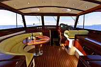 Classic interior style of a 2006 Portland 55 motoryacht, built by Abati yachts. Mediterranean. Tuscany, Italy.