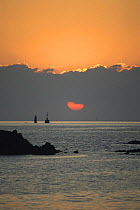 Sunset over the Mediterranean, from the coast of Alghero on the Italian island of Sardinia.