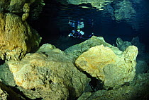 Diver in the Alabaster Cave (La Grotta dell'Alabastro) in the dive centre of Marina di Camerota, Campania, Italy.