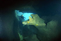 A scuba diver in the Alabaster Cave (La Grotta dell'Alabastro) in the dive centre of Marina di Camerota, Campania, Italy.
