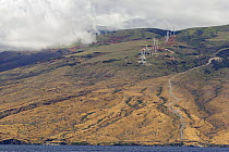 180 foot high towers of the largest wind farm in the state became operational in 2006, Maui, Hawaii.