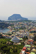 Aerial view of the small town of Bacoli (Pozzuoli) with the promontory of Capo Miseno in the background, near Naples, Campania region, Italy.