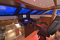 The cockpit and control area onboard Velvet 83', a luxurious motoryacht model from boatbuilders Cantieri Tecnomar, Viareggio, Italy.