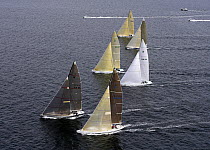 Modern fleet sailing upwind off the starting line, 12 Metre World Competition 2005, Newport, Rhode Island, USA.