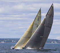 Two yachts racing neck and neck upwind during the 12 Metre World's Competition 2005, Newport, Rhode Island, USA.