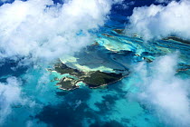 Aerial view with clouds, of Exuma, part of the chain of 365 islands that form the Bahamas.