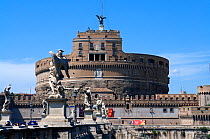 View of the Castel Sant'Angelo and the Ponte Sant' Angelo (Angel's Bridge), Rome, Italy. ^^^The castle is also known as the Mausoleum of Hadrian as it was commissioned by the Roman Emperor Hadrian as...
