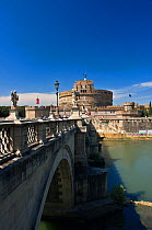View of the Castel Sant'Angelo and the Ponte Sant' Angelo (Angel's bridge), Rome, Italy. ^^^The castle is also known as the Mausoleum of Hadrian as it was commissioned by the Roman Emperor Hadrian as...