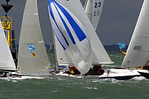 Darings round the leeward mark at South Ryde Middle in breezy conditions during Skandia Cowes Week, UK day 4 August 1, 2006.