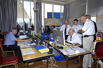 Race Officers on the Royal Yacht Squadron Platform with Chief course setter Ian Lallow at the computer during Skandia Cowes Week, UK, day 7 August 4, 2006.
