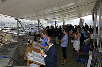 Race Officers on the Royal Yacht Squadron Platform and Cowes Radio Presenter Simon Vigar in the foreground during Skandia Cowes Week, Solent, UK, day 7 August 4, 2006.