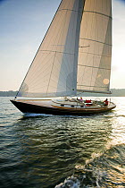 Friendship 40 cruising yacht. Model (man) and Property Released.