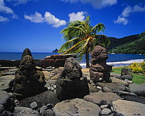 Traditional Polynesian statues in the Marquesas Islands, French Polynesia.