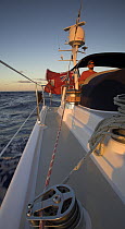 Cruising onboard 88ft sloop yacht "Shaman" at sunset, Dominican Republic, Caribbean.