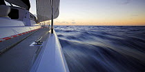 Cruising onboard 88ft sloop yacht "Shaman" at sunset, Dominican Republic, Caribbean. Property Released.