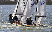 Racing Dabchick Dinghies during the Zeekoe Vlei Yacht Club (ZVYC) Races in Zeekoevlei, Cape Town, South Africa.