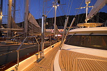 Teak decks of a superyacht docked for the night during the St. Baths Bucket Regatta, St Barthelemy, Caribbean.