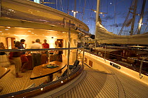 A party onboard a superyacht docked for the night during the St. Baths Bucket Regatta, St Barthelemy, Caribbean.