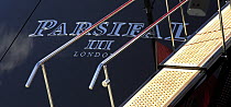 Detail of the stern of the superyacht "Parsifal III", with its passerelle deployed for easy boarding, St Barthelemy, Caribbean.