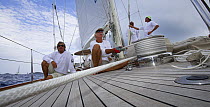 The crew working while racing a superyacht during the St Barths Bucket Regatta, St Barthelemy, Caribbean.