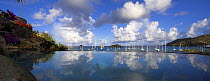 Clouds in the sky reflecting off the still waters of an infinity pool, St. Barthelemy, Caribbean.