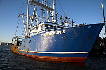Fishing boat "Courageous" docked at the fishing pier in Newport, Rhode Island, USA.