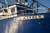 Fishing boat "Courageous" docked at the fishing pier in Newport, Rhode Island, USA.