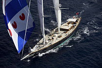 Aerial of 140ft luxury schooner "Skylge", designed by André Hoek and built by Holland Jachtbouw, sailing under spinnaker in the French Riviera, France. Property released.