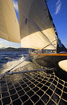 Looking towards the stern from the bowsprit onboard 140ft luxury schooner "Skylge", designed by André Hoek and built by Holland Jachtbouw, sailing in the French Riviera, France. Property released.