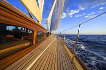 The teak decks onboard 140ft luxury schooner "Skylge", designed by André Hoek and built by Holland Jachtbouw, sailing in the French Riviera, France. Property released.