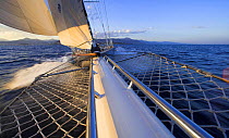 Looking back to the boat from the bowsprit of 140ft luxury schooner "Skylge", designed by André Hoek and built by Holland Jachtbouw, sailing in the French Riviera, France. Property released.