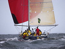 Downwind under spinnaker with grey skies during the Onion Patch Series 2006 in Newport, Rhode Island, USA.